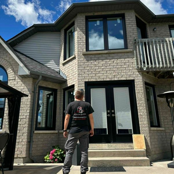 Window Experts crew installing windows at a Hamilton area house