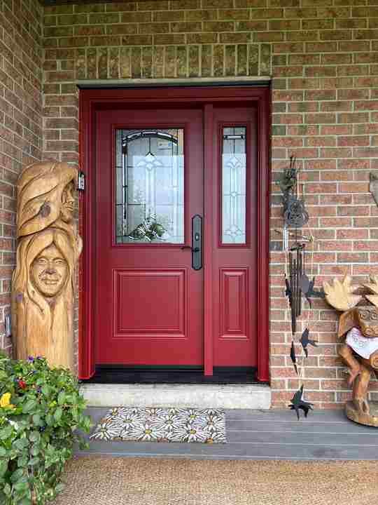 Burgundy entry door with decorative glass sidelight Burgundy entry door with decorative glass sidelight