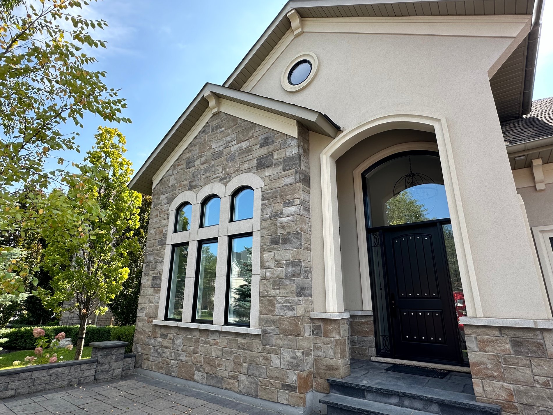 Spacious home exterior with large windows